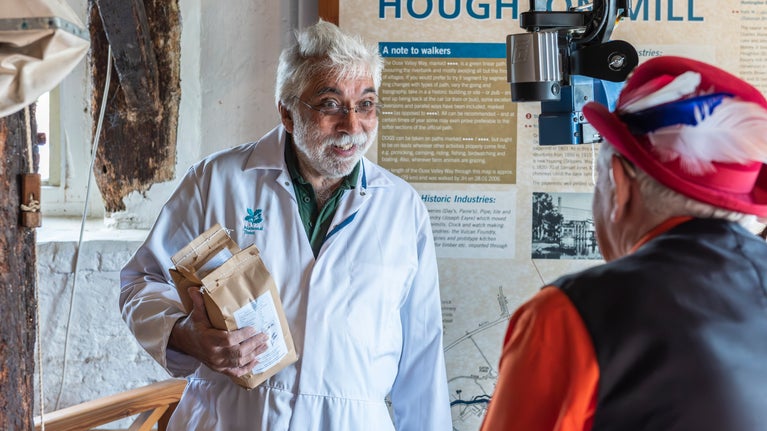 Volunteers with bags of flour